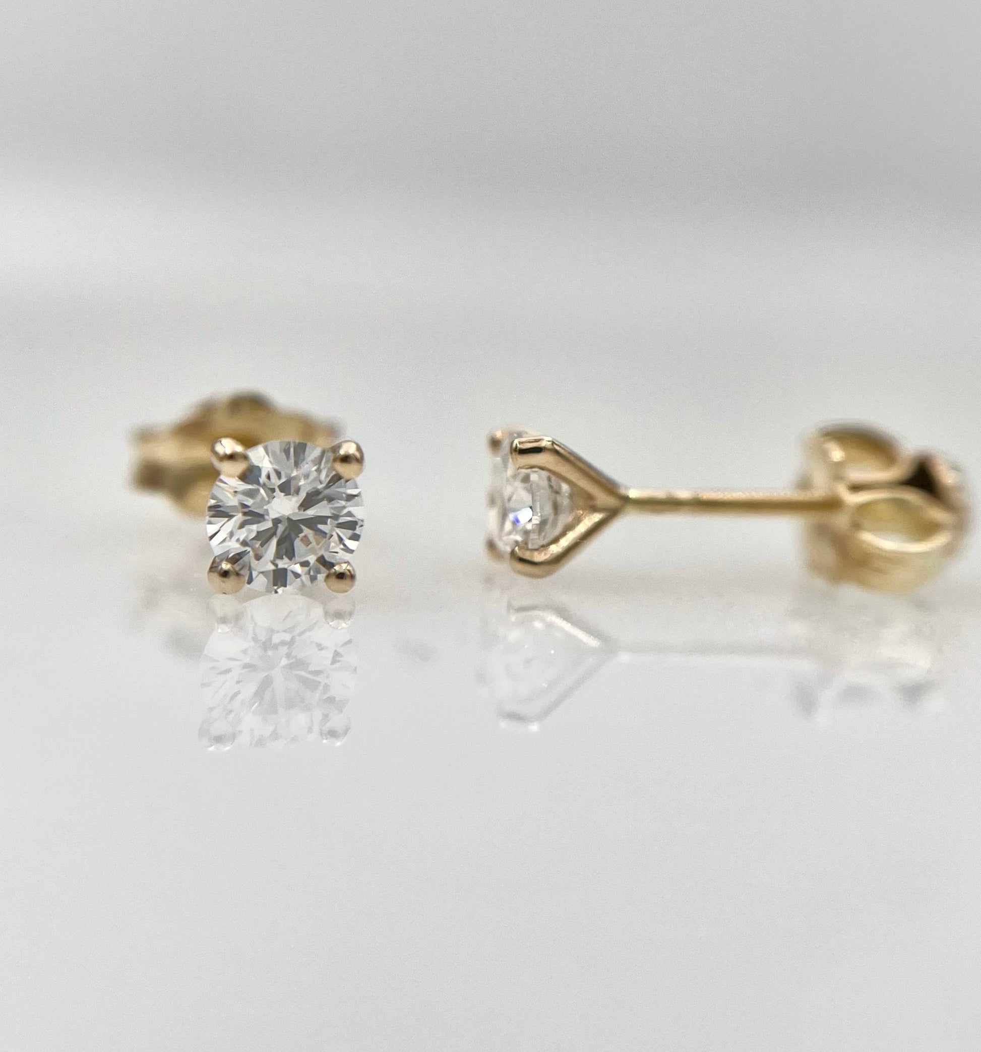 A pair of 0.5ct lab grown diamond stud earrings set in 14k gold