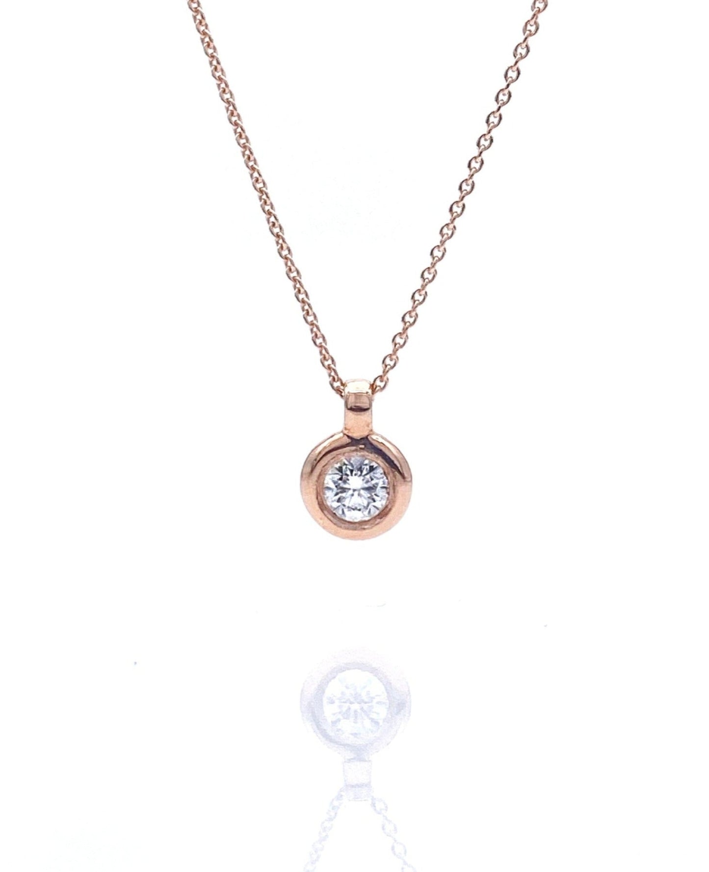 A classic 0.10ct diamond necklace with a 14k solid gold cable chain and a natural diamond centerpiece.