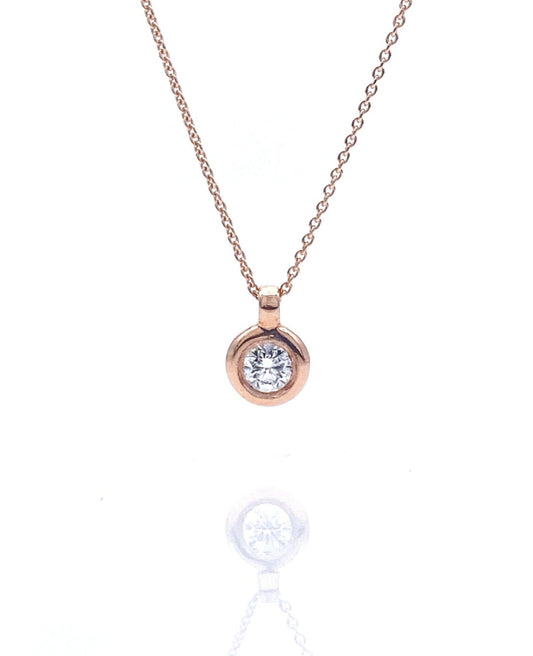 A classic 0.10ct diamond necklace with a 14k solid gold cable chain and a natural diamond centerpiece.
