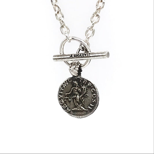 A sterling silver necklace with a pendant featuring an engraved image of Aequitas holding a cornucopia and a balance scale, with a chain of choice.